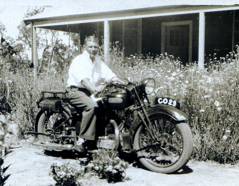 Dad on his AJC motor bike in font of the Lyells Mill home. Note ‘Collie’ registration.