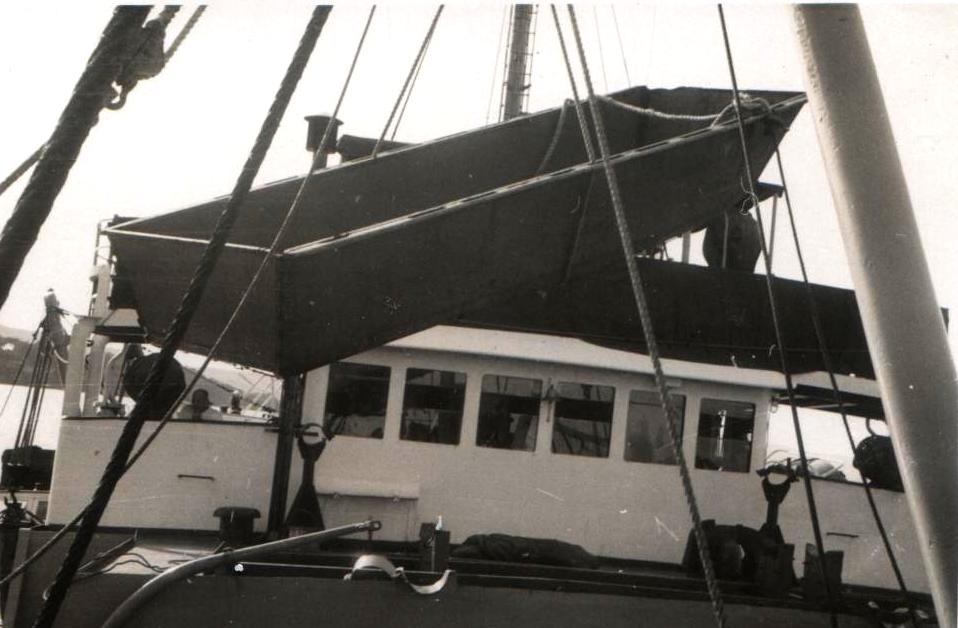 Landing craft being lifted and lowered