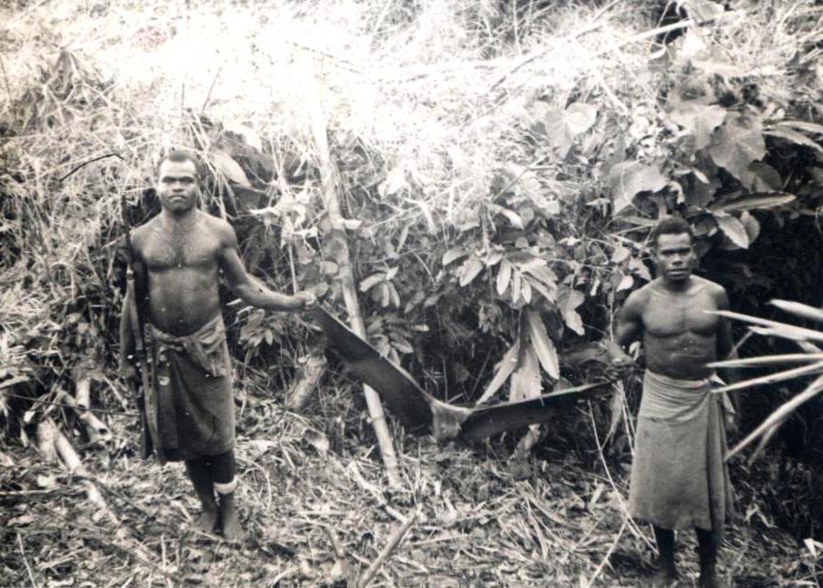 Ari and son displaying black bokis (bat)