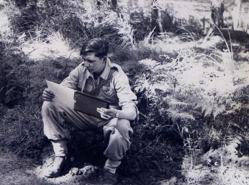 John Van de Graaff Pondering an air photo