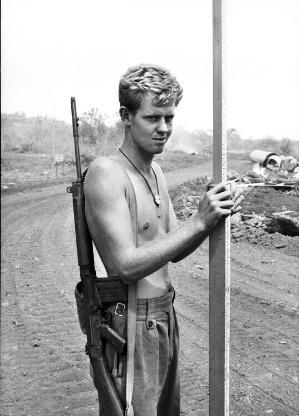 Spr Derek Chambers ‘holding the staff’ on cantonment survey.