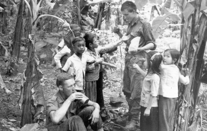 In Hoa Long Village – A young soldier in our protection group gets popular with the children