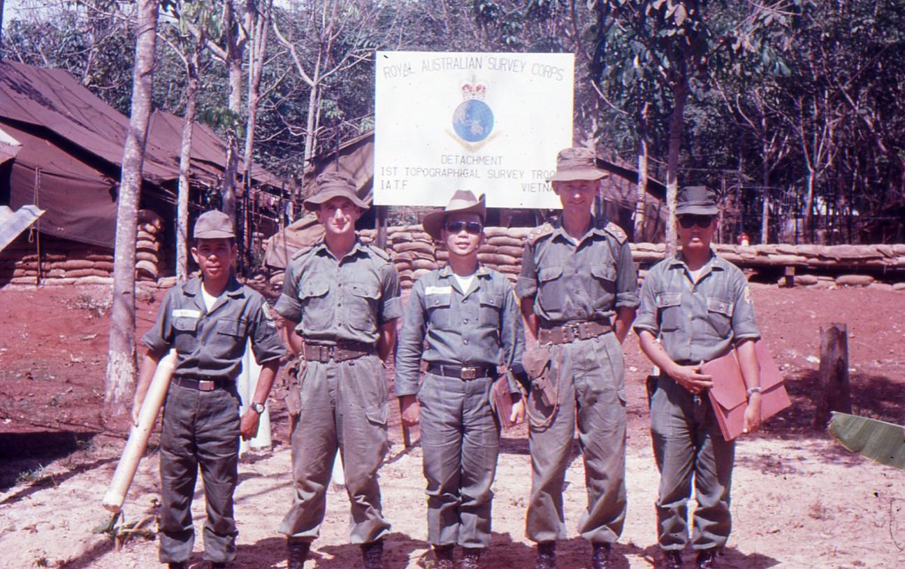 With our Vietnamese Allies from the AAVN Topographical Company at Nui Dat May 1967 – visiting Nui Dat Dai Uy Ngoc centre with Lieutenant McCloy to his left, Captain Skitch to his right. AAVN Warrant officers at ether end.