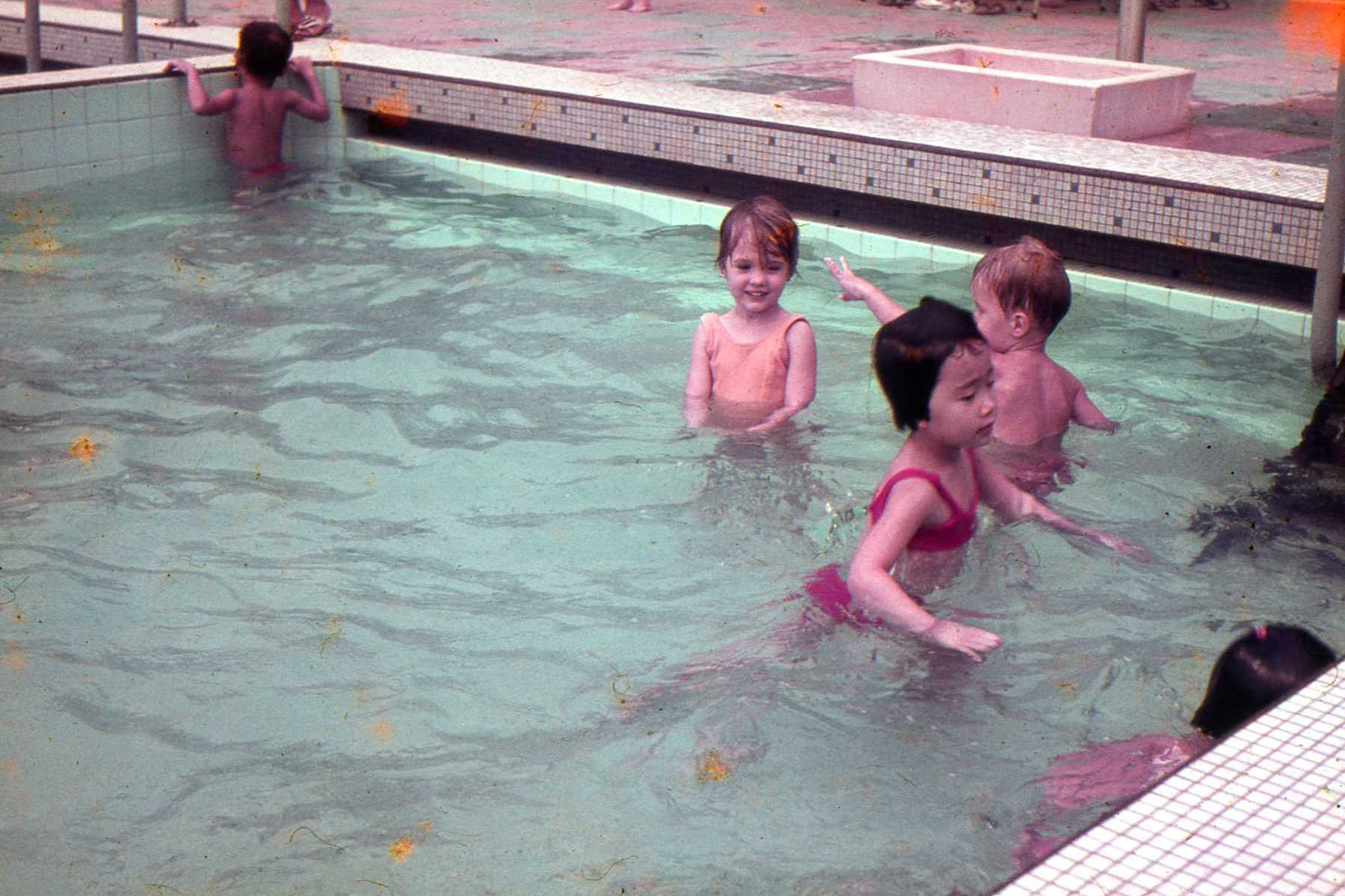 Sarah in the pool at the Tanglin Club