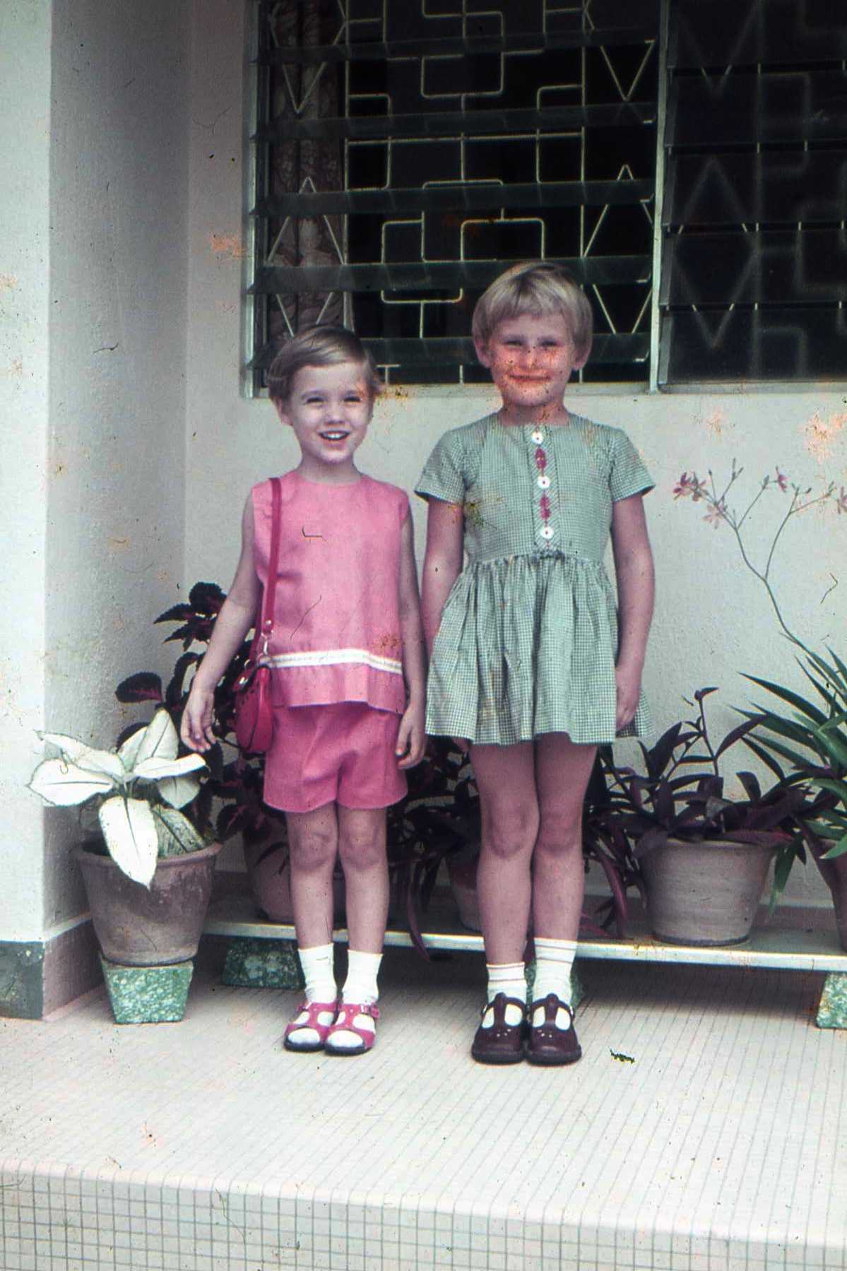 Sarah with a friend on our front porch