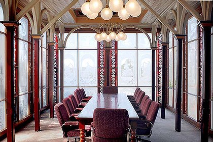 The conservatory – now a conference room –*note the etched and ruby glass window panels*